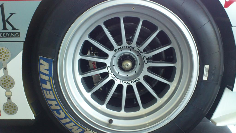 Illustration for article titled Audi R18 E-Tron (was) parked at Volkswagen Financial Services lobby
